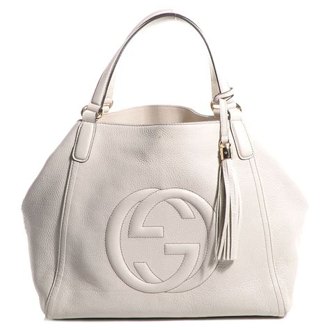 gucci elegante|white Gucci handbag.